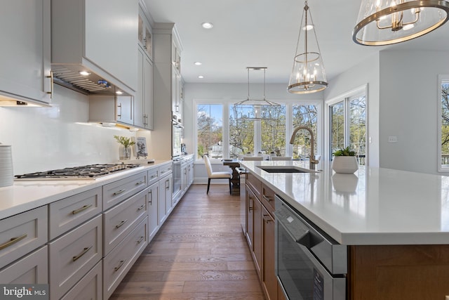 629 S Orange St, Media, PA 19063 - kitchen with a sink, a chandelier, stainless steel gas stovetop, plenty of natural light, and recessed lighting
