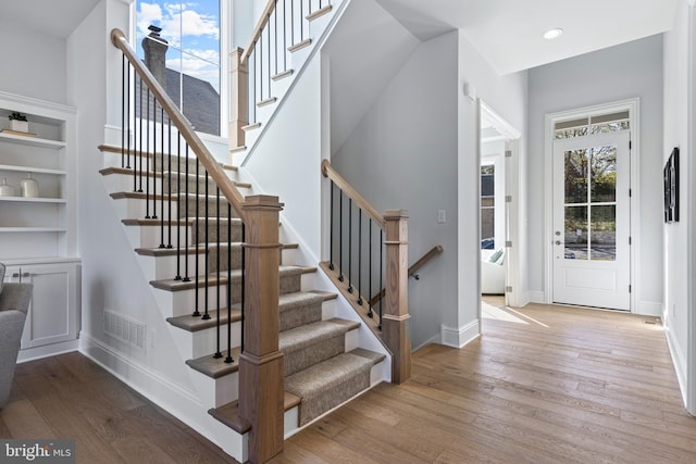 629 S Orange St, Media, PA 19063 - stairway featuring wood finished floors, baseboards, and recessed lighting