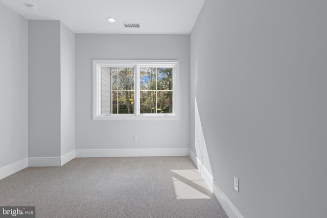 629 S Orange St, Media, PA 19063 - empty room featuring light colored carpet, baseboards, recessed lighting, and a smoke detector