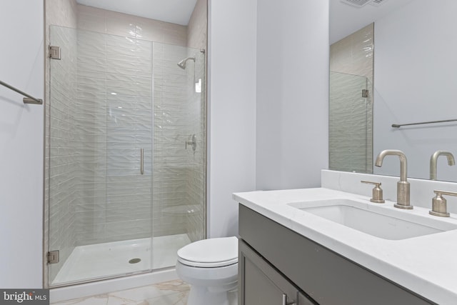 629 S Orange St, Media, PA 19063 - full bathroom with marble finish floors, vanity, toilet, and a shower stall