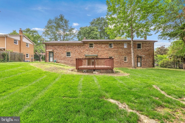 6913 Fulford St, Clinton, MD 20735 - back of house featuring a deck and brick siding