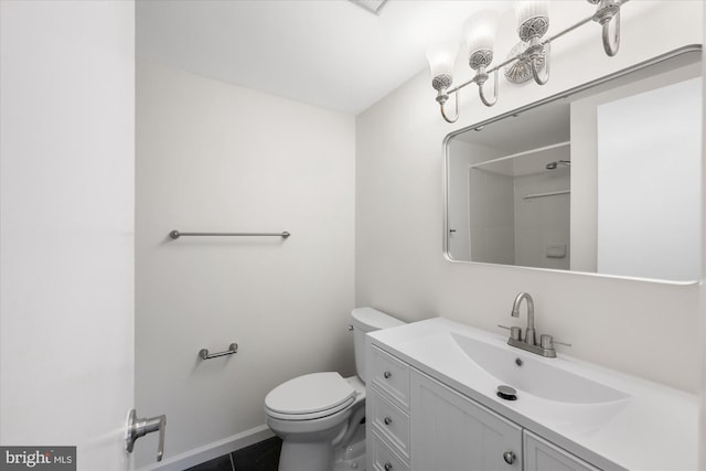 6270 Edsall Rd Unit 101, Alexandria, VA 22312 - bathroom featuring toilet, vanity, a shower, and baseboards