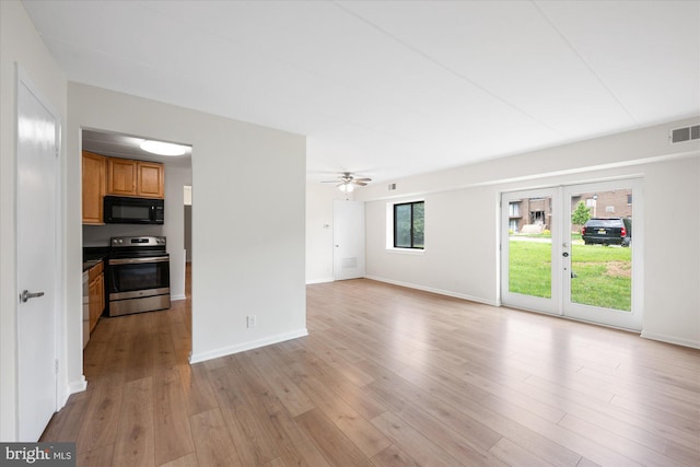6270 Edsall Rd Unit 101, Alexandria, VA 22312 - unfurnished living room with light wood-style floors, baseboards, and a ceiling fan