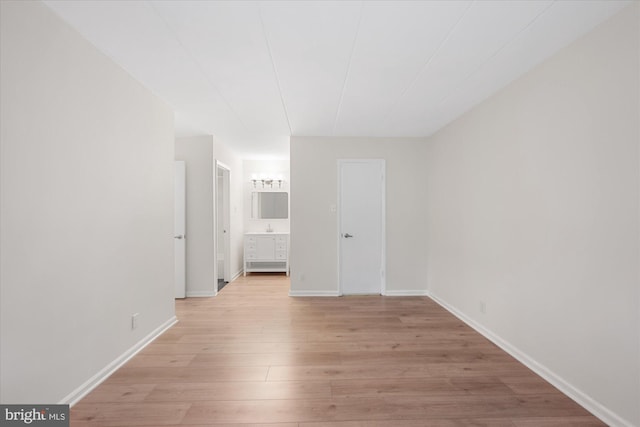 6270 Edsall Rd Unit 101, Alexandria, VA 22312 - spare room with light wood-type flooring and baseboards