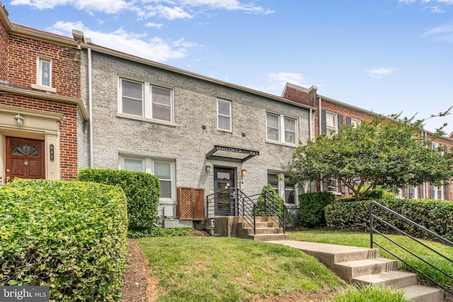 961 Randolph St NW Unit 3, Washington, DC 20011 - townhome / multi-family property featuring a front yard and brick siding
