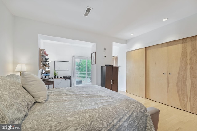 961 Randolph St NW Unit 3, Washington, DC 20011 - bedroom featuring light wood-type flooring, an office area, a closet, and recessed lighting