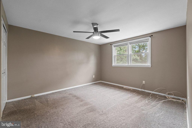 911 Circle Dr, Baltimore, MD 21227 - spare room with carpet, a ceiling fan, and baseboards