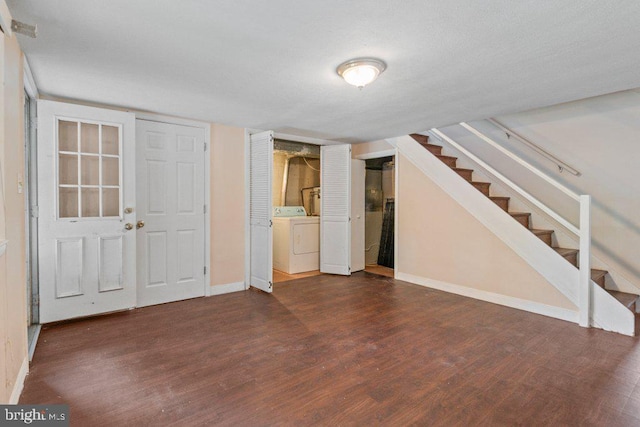 911 Circle Dr, Baltimore, MD 21227 - finished basement with washer / clothes dryer, dark wood finished floors, stairway, and baseboards