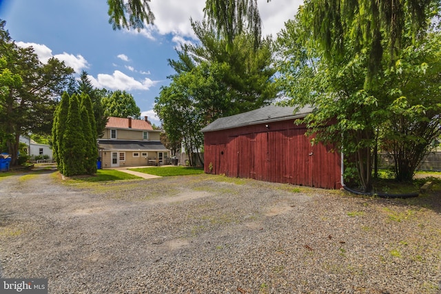 131 Main, Medford, NJ 08055 - view of side of property featuring driveway and an outdoor structure