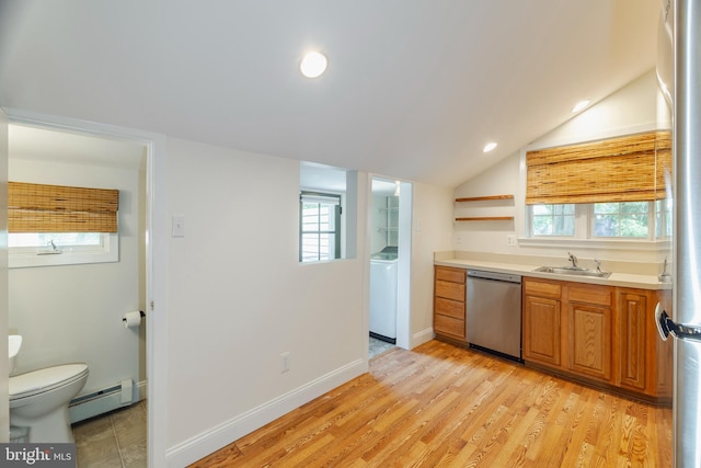 131 Main, Medford, NJ 08055 - kitchen featuring appliances with stainless steel finishes, a baseboard radiator, a sink, washer / dryer, and light countertops