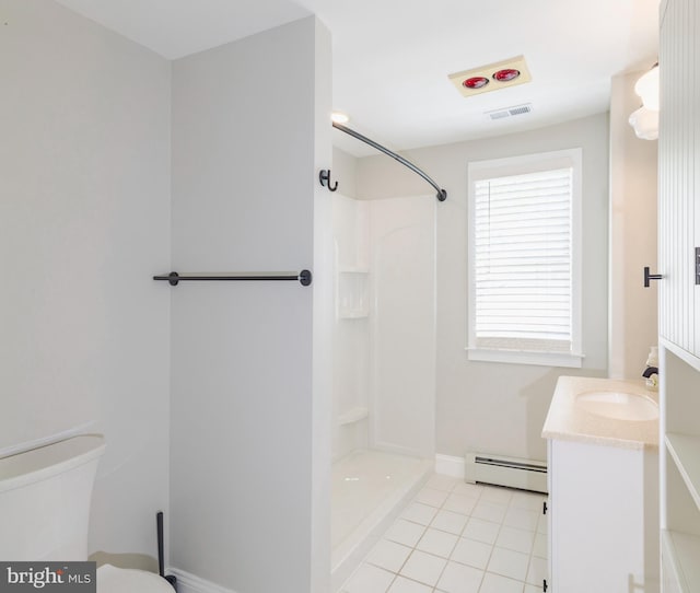 131 Main, Medford, NJ 08055 - bathroom with baseboard heating, vanity, tile patterned floors, a shower, and toilet