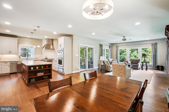 2371 N Edgewood St, Arlington, VA 22207 - dining area featuring plenty of natural light, light wood-style flooring, and recessed lighting