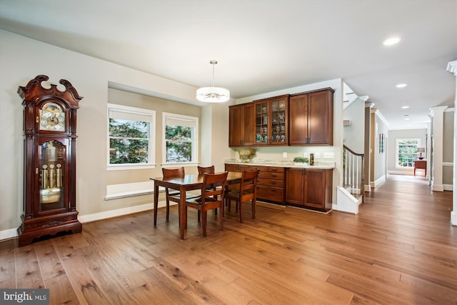 2371 N Edgewood St, Arlington, VA 22207 - dining room with light wood-style flooring, baseboards, stairway, recessed lighting, and ornamental molding