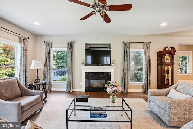 2371 N Edgewood St, Arlington, VA 22207 - living room with a fireplace, wood finished floors, healthy amount of natural light, and recessed lighting