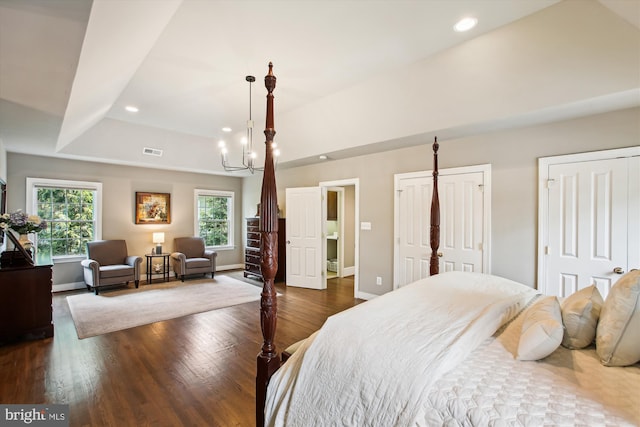 2371 N Edgewood St, Arlington, VA 22207 - bedroom featuring recessed lighting, wood finished floors, two closets, a tray ceiling, and a chandelier