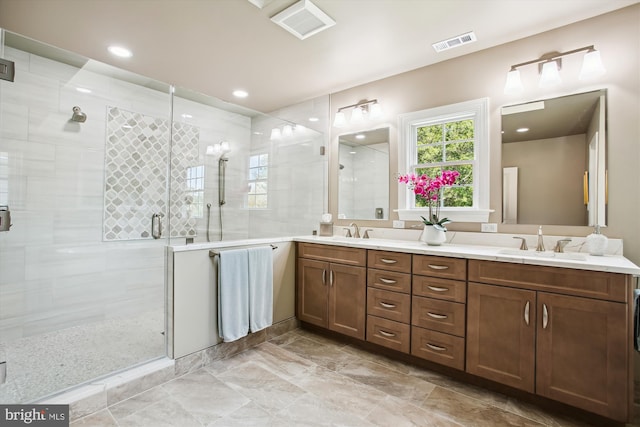 2371 N Edgewood St, Arlington, VA 22207 - bathroom featuring double vanity, a shower stall, and recessed lighting