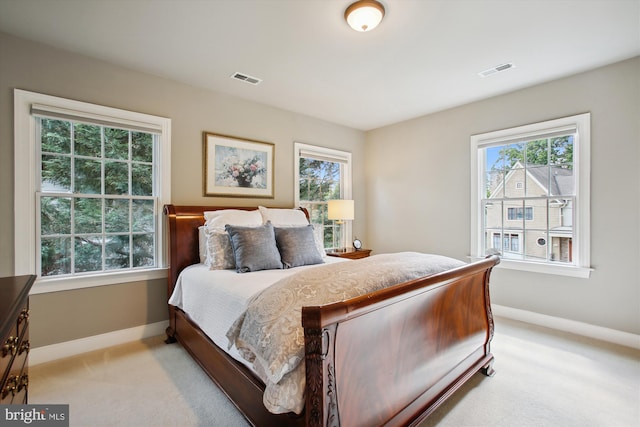 2371 N Edgewood St, Arlington, VA 22207 - bedroom featuring light colored carpet, baseboards, and multiple windows