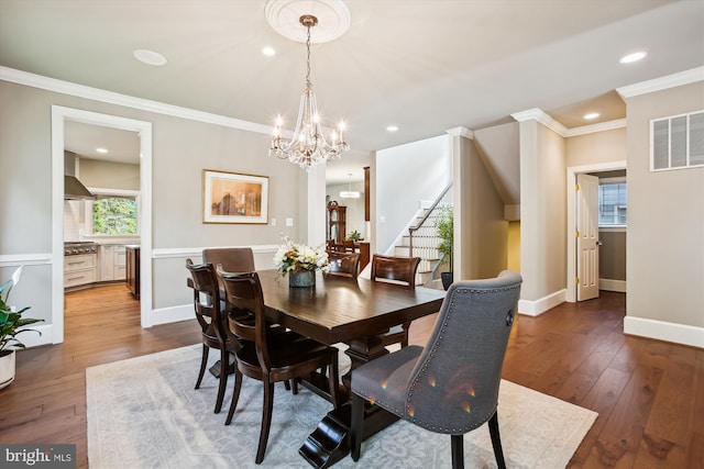 2371 N Edgewood St, Arlington, VA 22207 - dining space with a chandelier, stairs, crown molding, hardwood / wood-style floors, and recessed lighting