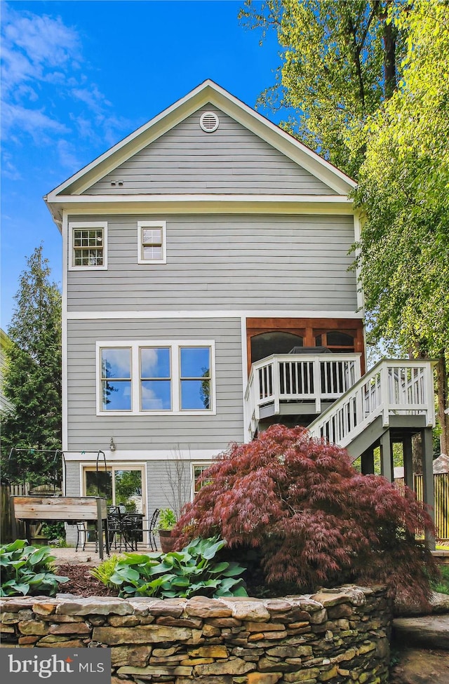 2371 N Edgewood St, Arlington, VA 22207 - rear view of property with stairs and a deck
