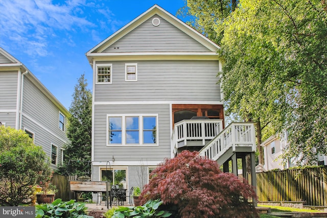 2371 N Edgewood St, Arlington, VA 22207 - rear view of house with stairs and a wooden deck