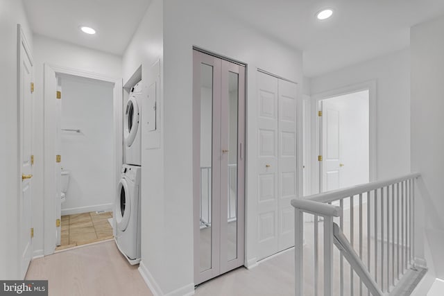 20036 Appledowre Cir Unit 450, Germantown, MD 20876 - washroom featuring stacked washer / drying machine, baseboards, and recessed lighting