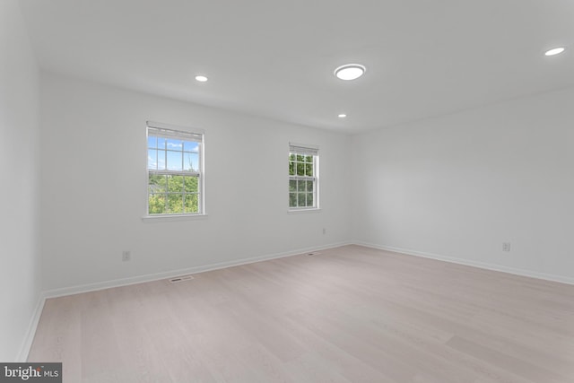 20036 Appledowre Cir Unit 450, Germantown, MD 20876 - empty room featuring light wood-style floors, recessed lighting, and baseboards