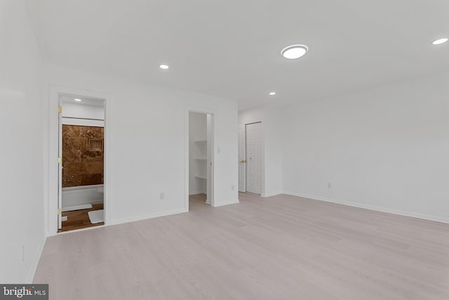 20036 Appledowre Cir Unit 450, Germantown, MD 20876 - unfurnished bedroom featuring light wood finished floors, recessed lighting, baseboards, ensuite bathroom, and a spacious closet