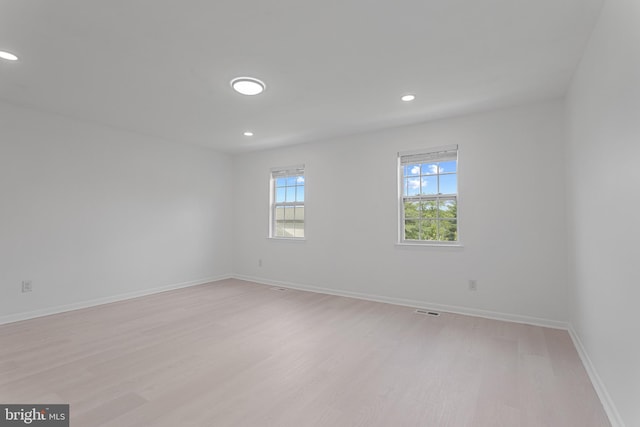 20036 Appledowre Cir Unit 450, Germantown, MD 20876 - spare room with light wood-style floors, recessed lighting, and baseboards