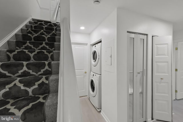 20036 Appledowre Cir Unit 450, Germantown, MD 20876 - laundry area with estacked washer and dryer and baseboards