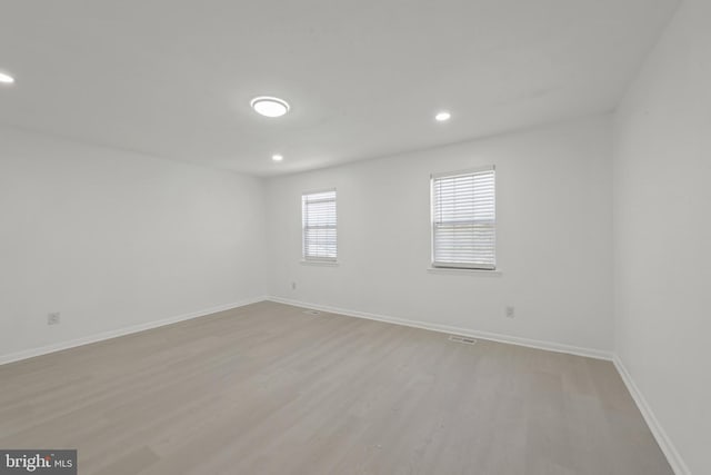 20036 Appledowre Cir Unit 450, Germantown, MD 20876 - unfurnished room with light wood finished floors, recessed lighting, and baseboards