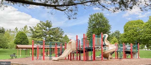 20036 Appledowre Cir Unit 450, Germantown, MD 20876 - community jungle gym featuring a lawn