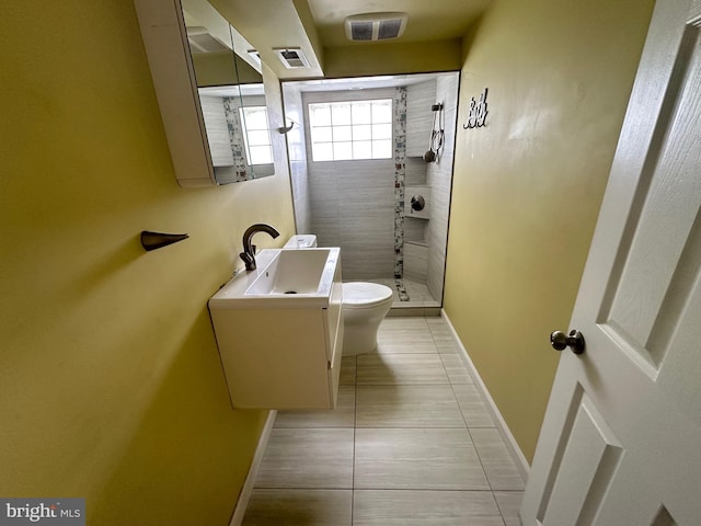8854 Calvert St, Philadelphia, PA 19152 - full bath featuring a stall shower, baseboards, toilet, tile patterned floors, and vanity