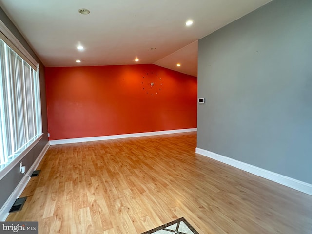 8854 Calvert St, Philadelphia, PA 19152 - spare room with light wood-style flooring, lofted ceiling, baseboards, and recessed lighting
