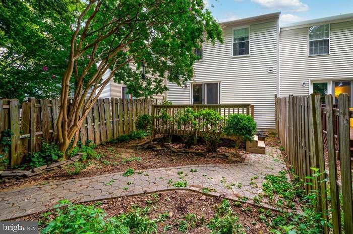 2506 Log Mill Ct, Crofton, MD 21114 - fenced backyard featuring a wooden deck