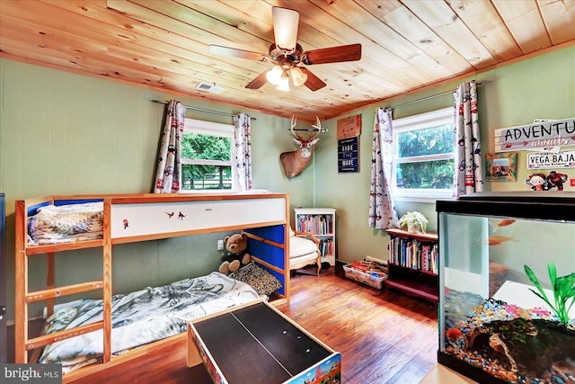 2122 Harkins Rd, Pylesville, MD 21132 - bedroom with wood ceiling, multiple windows, and wood finished floors