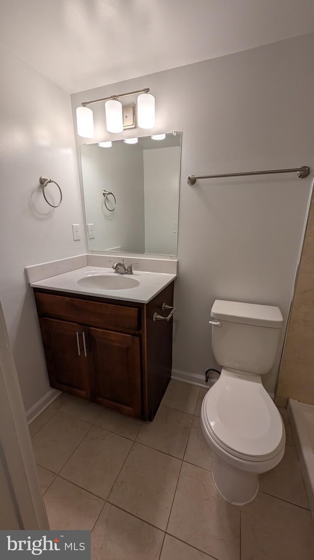 104 Duvall Ln Unit 30-104, Gaithersburg, MD 20877 - bathroom featuring vanity, toilet, and baseboards