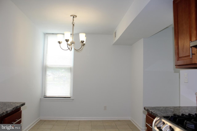 104 Duvall Ln Unit 30-104, Gaithersburg, MD 20877 - dining space with a chandelier, baseboards, and light tile patterned floors