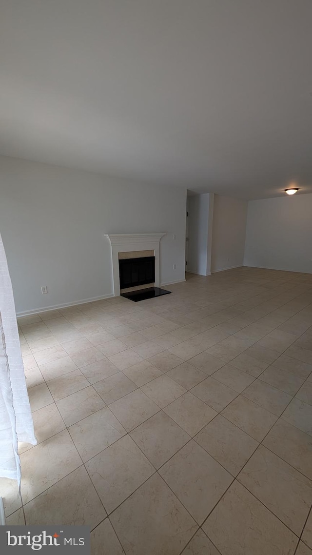 104 Duvall Ln Unit 30-104, Gaithersburg, MD 20877 - unfurnished living room with a fireplace
