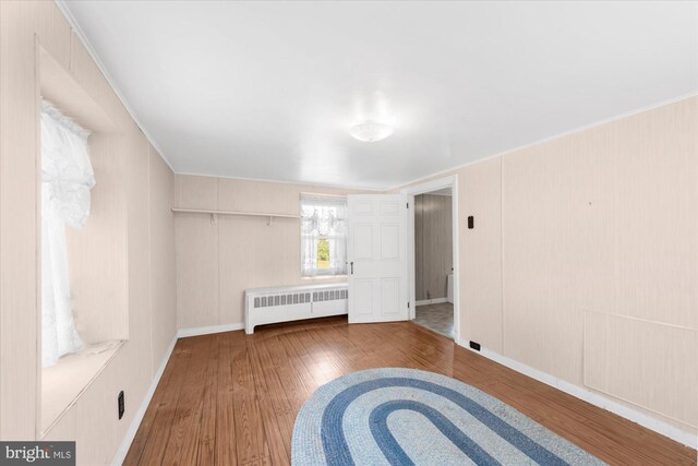 2138 Hill Rd, Perkiomenville, PA 18074 - spare room with radiator, wood finished floors, and baseboards