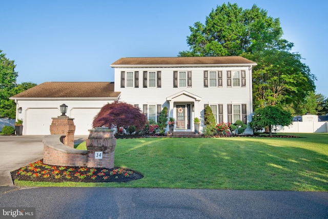 14 N Horseshoe Dr, Milford, DE 19963 - colonial house featuring driveway and a garage