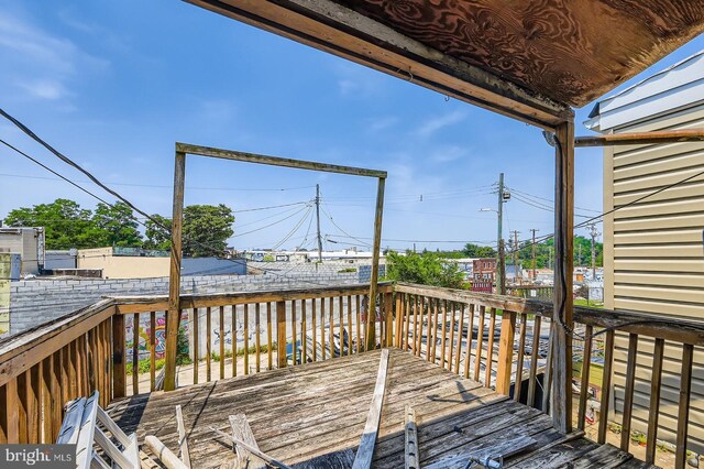 12 Kresson St N, Baltimore, MD 21224 - wooden deck featuring a fenced backyard