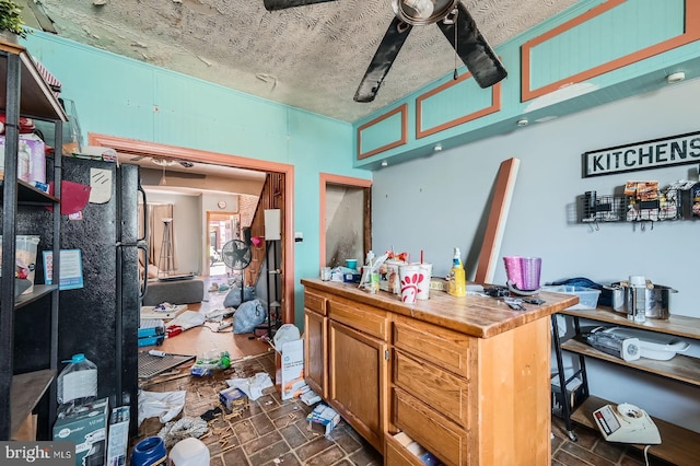 12 Kresson St N, Baltimore, MD 21224 - misc room with a textured ceiling