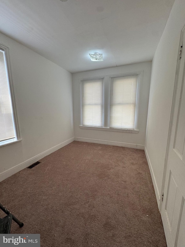 423 Trenton Ave, Camden, NJ 08103 - carpeted spare room with plenty of natural light and baseboards
