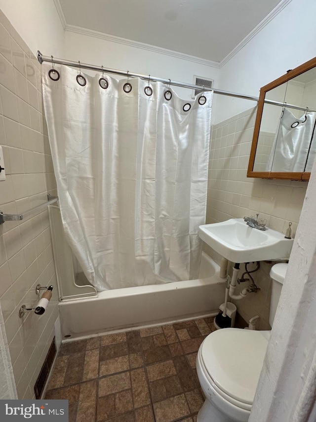 423 Trenton Ave, Camden, NJ 08103 - full bathroom featuring tile walls, shower / tub combo, toilet, a sink, and ornamental molding