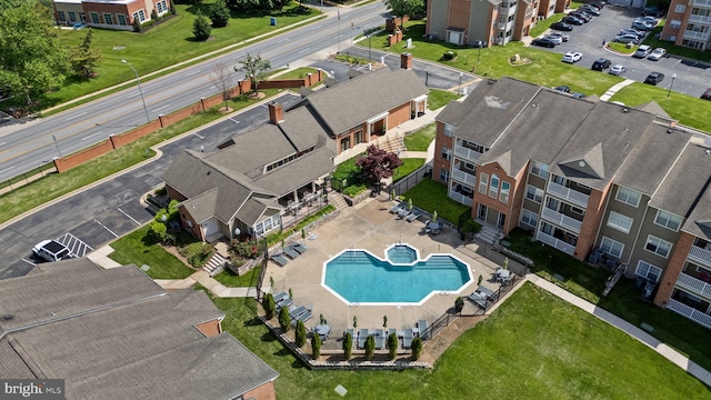 1490 Greenbriar Cir Unit 1-1490, Pikesville, MD 21208 - drone / aerial view of a pool area