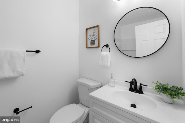 1490 Greenbriar Cir Unit 1-1490, Pikesville, MD 21208 - bathroom featuring toilet and vanity