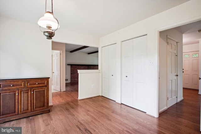 1881 Cold Creek Ct, Vienna, VA 22182 - unfurnished dining area featuring light wood-type flooring and baseboards