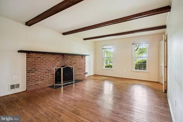 1881 Cold Creek Ct, Vienna, VA 22182 - unfurnished living room with hardwood / wood-style floors, a fireplace, beam ceiling, and baseboards