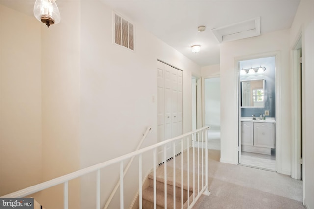 1881 Cold Creek Ct, Vienna, VA 22182 - hall featuring an upstairs landing, attic access, and carpet