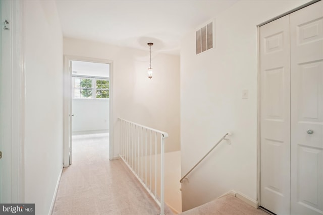 1881 Cold Creek Ct, Vienna, VA 22182 - hallway featuring an upstairs landing and light colored carpet